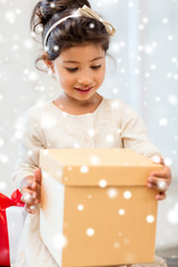 happy child girl with gift box
