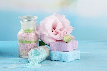 Aromatic salts in glass bottles,  on blue background