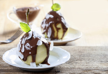 Pear with chocolate sauce