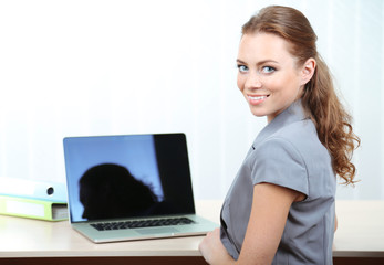 Woman in office at workplace