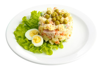 Russian traditional salad Olivier, isolated on white
