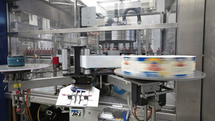 Conveyor line, machine for pasting labels for beer bottles