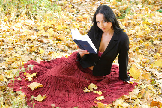 nice girl outdoor with book
