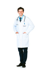 Full length portrait of the smiling doctor standing on a white