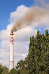 Air pollution coming from factory chimney