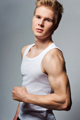 Young handsome blond man wearing t-shirt