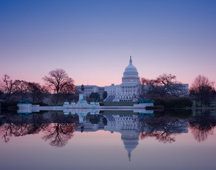 Sunrise behind the dome of the Capitol in DC