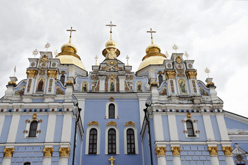 golden cross and towers from cathedral in ukraine