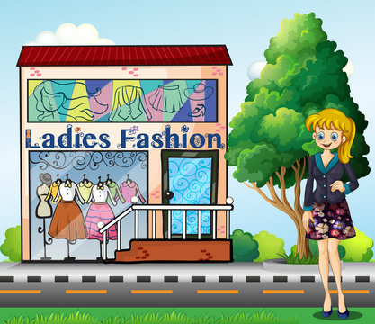 A lady in front of the ladies fashion store