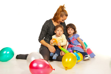 Fototapeta na wymiar Happy mom with two kids