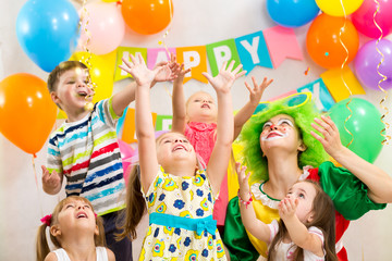 jolly kids group with clown celebrating  birthday party © Oksana Kuzmina