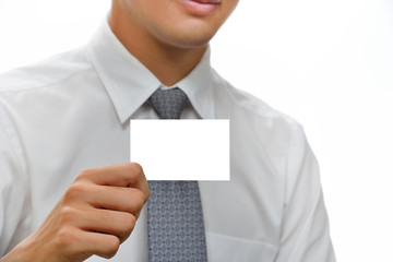 Businessman showing blank business card.