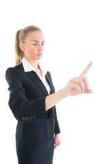 Side view of attractive young businesswoman pointing