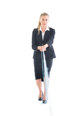 Serious young businesswoman using a hose