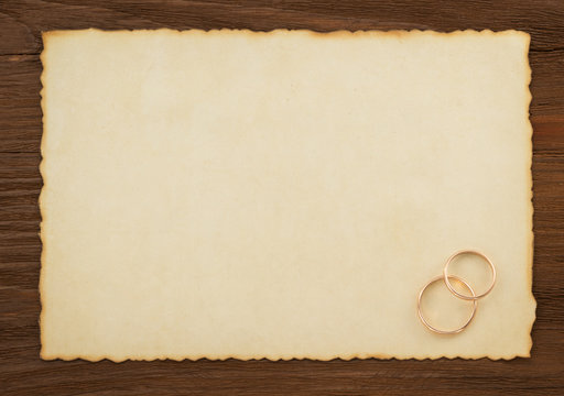 Wedding Ring And Aged Paper