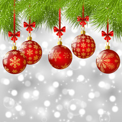 Christmas tree branches with red balls