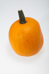 Fresh orange pumpkin isolated on white background