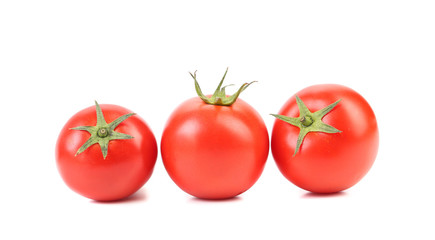 Three red ripe tomatoes