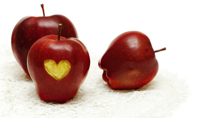 apples with heart isolated on white background