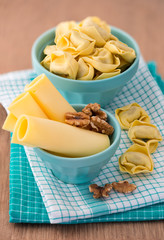 Bowl of tortellini homemade with cheese and walnuts