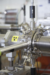 Details of ION accelerator with radiation warning sign