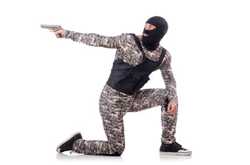 Soldier in camouflage with gun on white