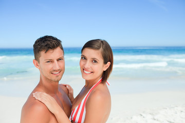Fototapeta premium Beautiful couple at the beach