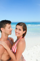 Fototapeta premium Beautiful couple at the beach