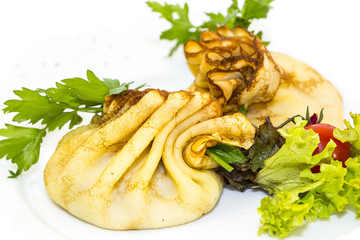 pancakes with meat on a table in a restaurant