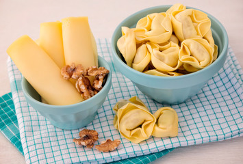 Bowl of tortellini homemade with cheese and walnuts