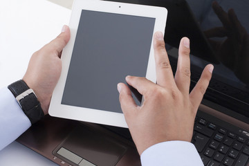 Businessman holding a tablet