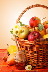 Close up of a basket with autumn fruits