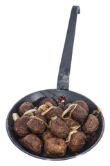 Meatballs in a pan on white