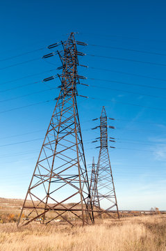 support high-voltage line in the field autumn