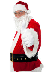 Happy santa gesturing thumbs up
