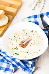 Cheese soup with smoked ribs