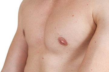 Chest and pectoral muscles of a young muscular slim athlete man