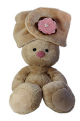 Brown teddy bunny with rose nose and flower on the ear isolated