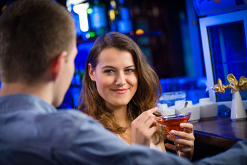 young woman in a bar