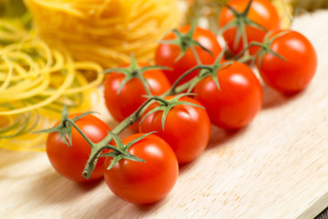 close-up of cherry tomatoes and pasta