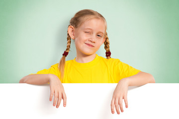 girl holding a white banner