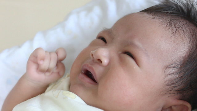 Footage of asian baby crying