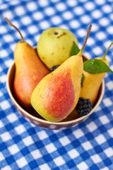 Fresh and tasty pears in a  bowl