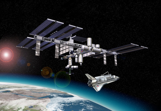 Space station in orbit around Earth, with Shuttle.