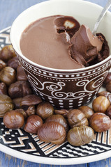 Peeled roasted chestnuts and chocolate cream ganache