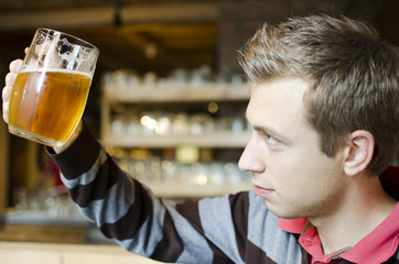 Young man in a pub