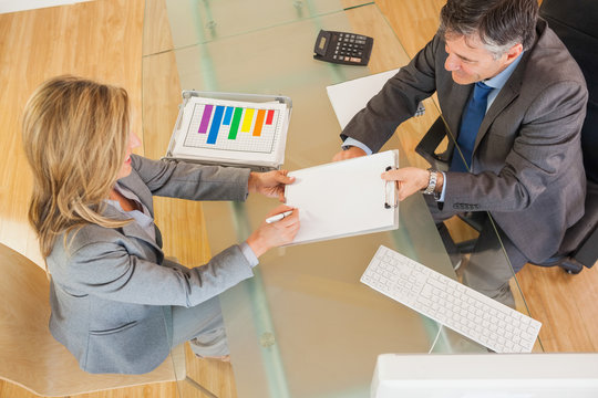 Two business people negociating in an office