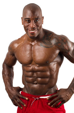 Confident black bodybuilder smiling