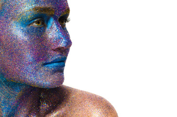 Beautiful face of a woman covered in glitter