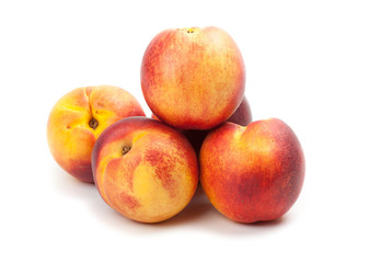 Naklejka na ściany i meble Ripe peaches fruits isolated on white